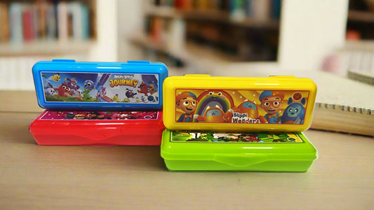 Four colorful pencil cases with cartoon characters.