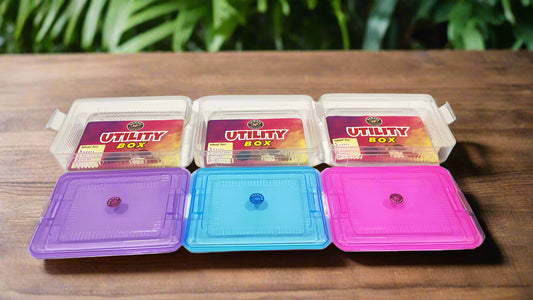 Set of colorful storage boxes with lids.